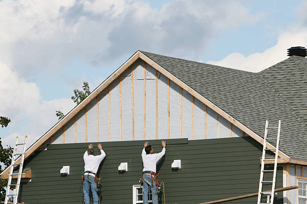 Professional Storm Damage Siding Repair technician working in Frankfort, OH